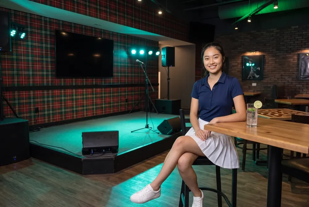 A woman by the empty pub stage in Sydney